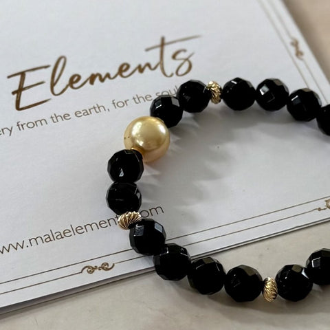 Phoenix Gold – Ebony & South Sea Pearl Bracelet