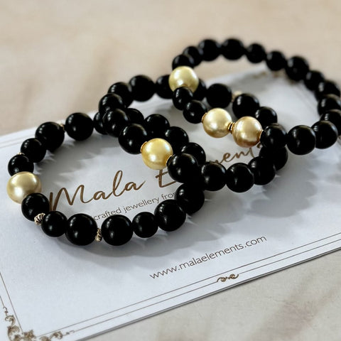 Phoenix Gold – Ebony & South Sea Pearl Bracelet