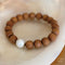 Ella South Sea Pearl & Wood bracelets