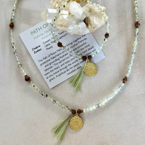 Fine prehnite crystal necklace with Buddhist charm